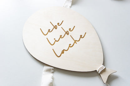 Luftballon mit Spruch "Lebe, Liebe, Lache"