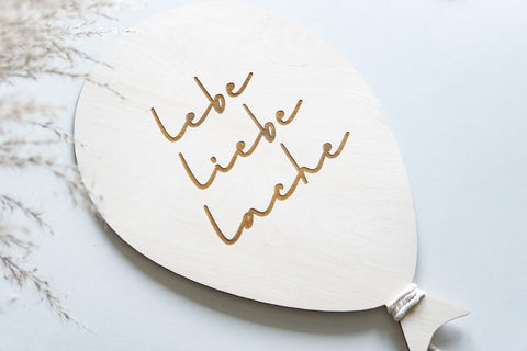 Luftballon mit Spruch "Lebe, Liebe, Lache"